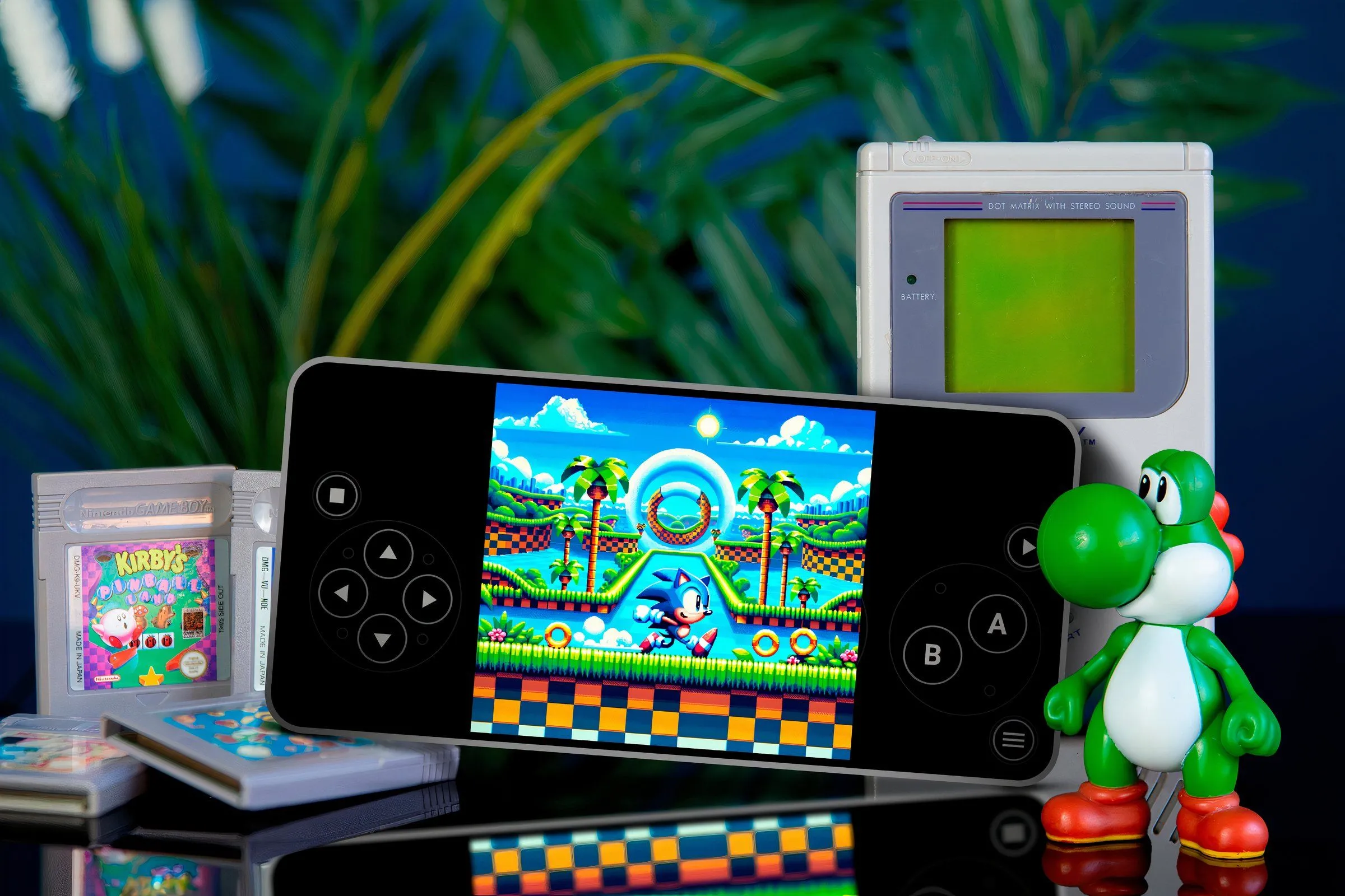 Điện thoại chạy game Sonic trong trình giả lập, xung quanh có một số băng game và mô hình Yoshi