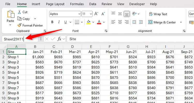 Giao diện Excel với hộp tên chứa tham chiếu Sheet2!H11, minh họa cách chuyển đổi giữa các trang tính bằng tên ô.