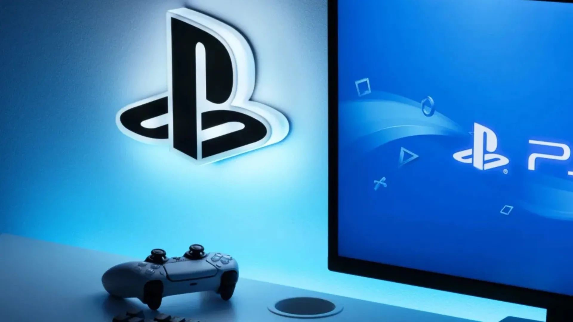 Logo PlayStation và bộ điều khiển PS5, thể hiện sự phát triển của hệ máy console.