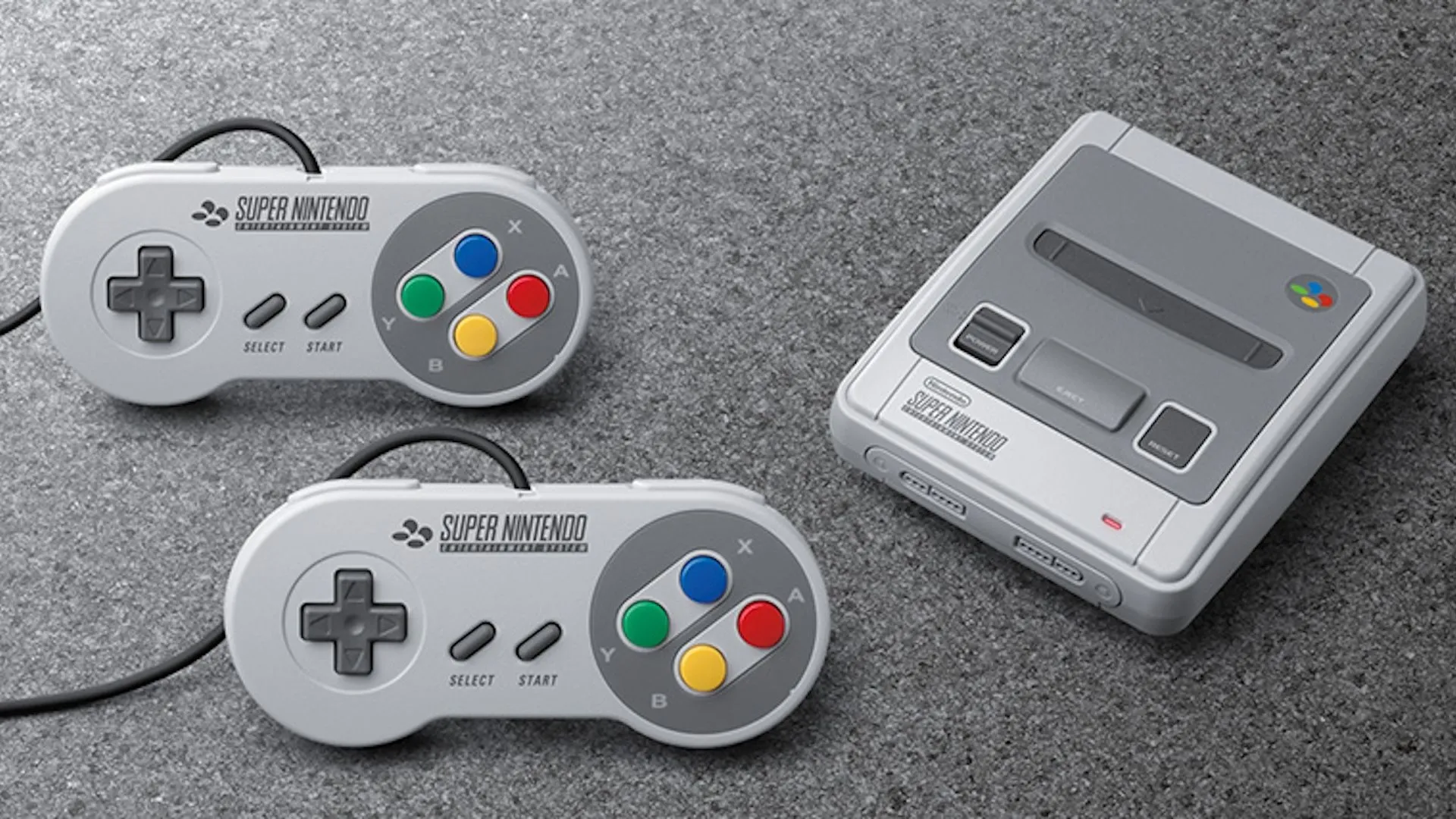 Bộ console NES Classic và hai tay cầm đặt trên thảm