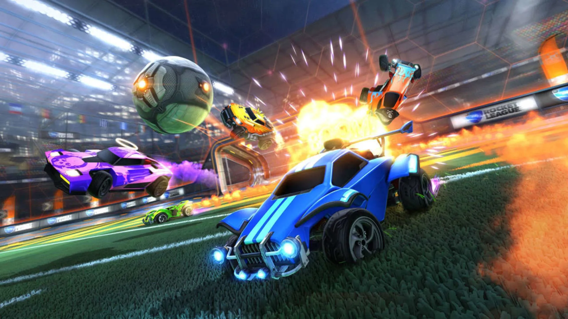 Cảnh hỗn loạn với những chiếc ô tô và quả bóng bay trên không trong game Rocket League.