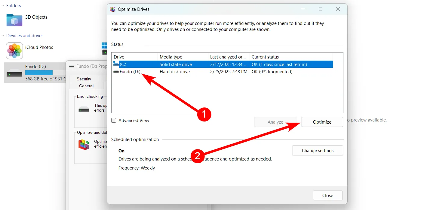 Giao diện công cụ &quot;Optimize Drives&quot; trên Windows 11, hiển thị danh sách ổ đĩa và nút Optimize cho HDD.