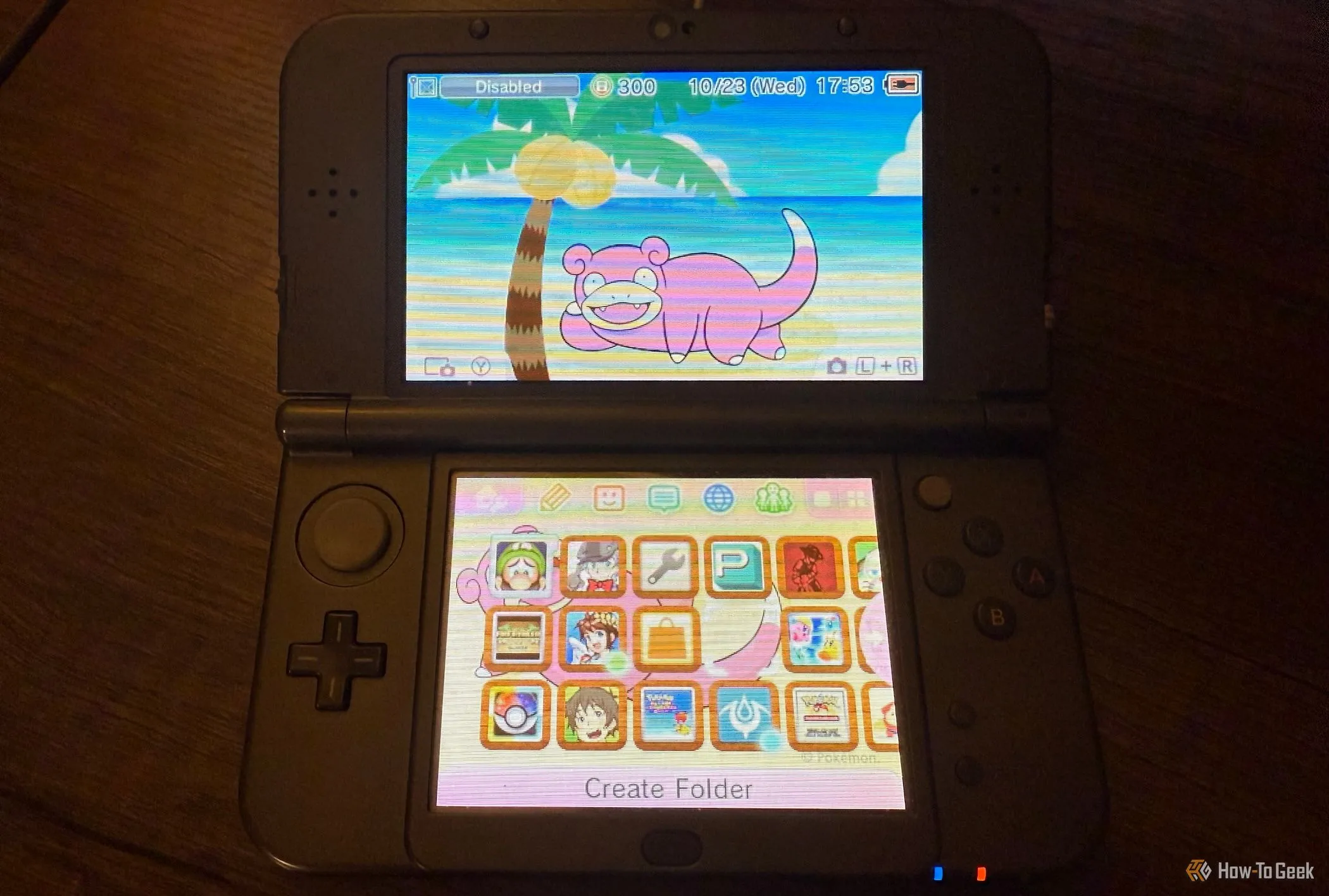 Màn hình chính của New Nintendo 3DS XL với chủ đề Slowpoke, gợi nhắc về thời kỳ console màn hình nhỏ vẫn được ưa chuộng.