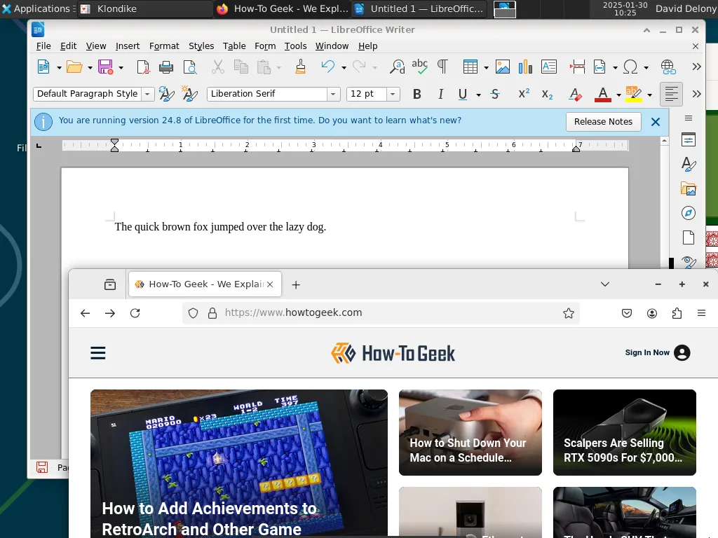 Màn hình desktop Xfce của FreeBSD hiển thị các ứng dụng Firefox, LibreOffice Writer và game Aisleriot solitaire đang chạy, cho thấy khả năng đa nhiệm của hệ điều hành