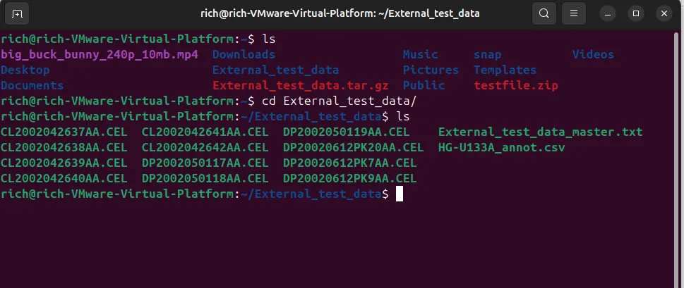 Màn hình Terminal hiển thị nội dung thư mục sau khi di chuyển vào một thư mục đã giải nén trên Linux.