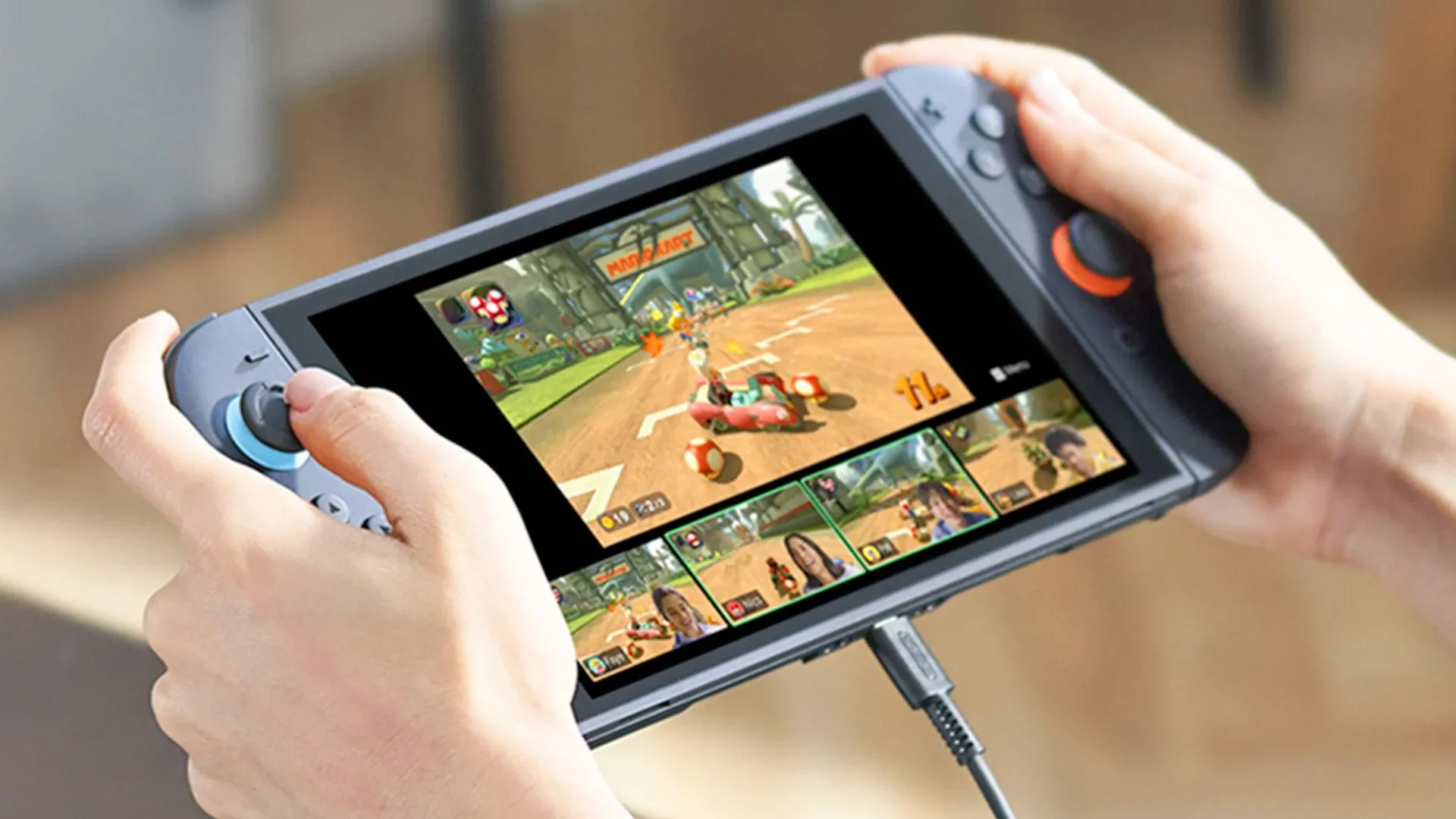 Người dùng đang chơi game trên Nintendo Switch 2 ở chế độ cầm tay, thể hiện tính linh hoạt của máy