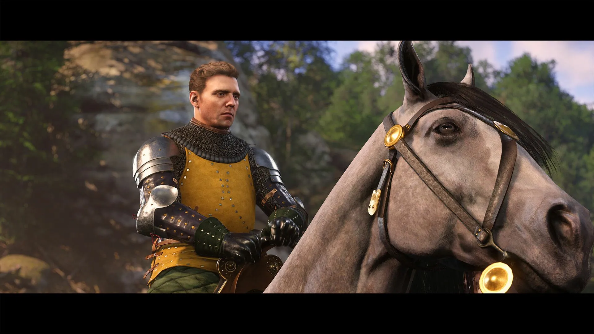 Nhân vật chính của Kingdom Come Deliverance 2 trên lưng ngựa.