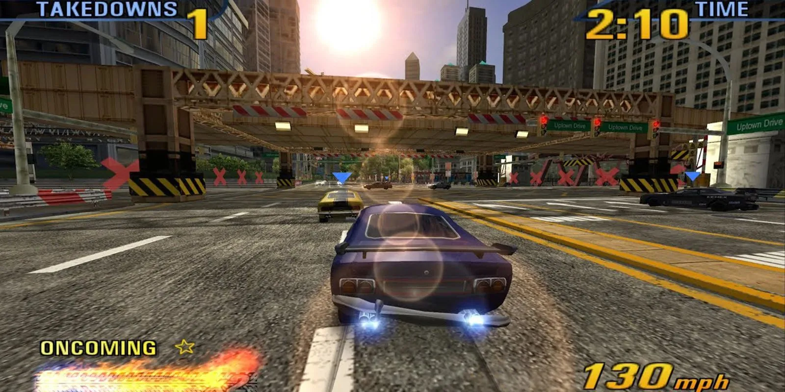 Xe đua đang di chuyển tốc độ cao trên đường trong game Burnout 3, thể hiện gameplay hành động